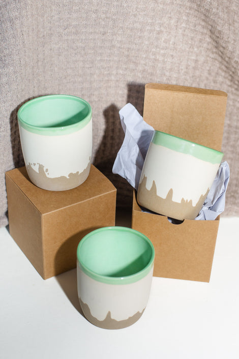 Photo of three of the LA mugs styled together.